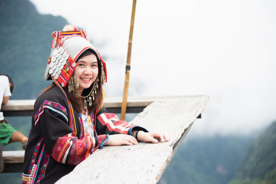 Mujer asiática de visita en mihong
